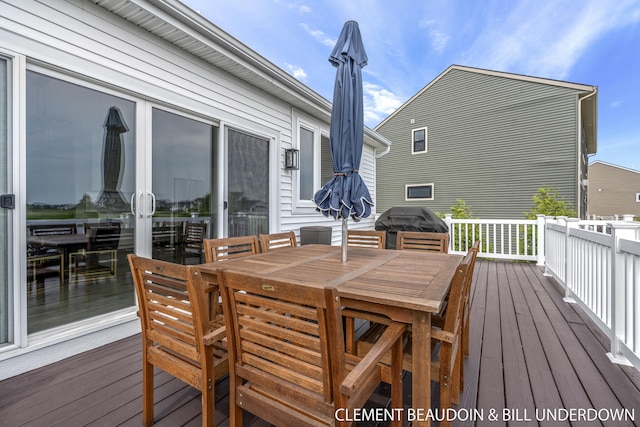 13944 Harrington Lndg, Holland, MI 49424 - wooden terrace featuring a grill and outdoor dining area