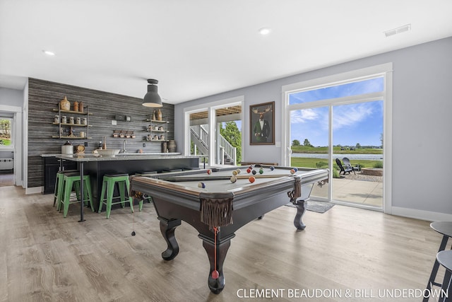 13944 Harrington Lndg, Holland, MI 49424 - game room with billiards, plenty of natural light, light wood-style floors, and recessed lighting