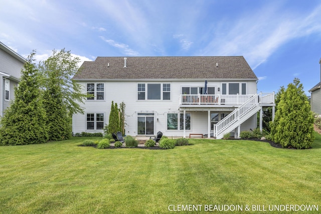 13944 Harrington Lndg, Holland, MI 49424 - rear view of property with stairway, a deck, and a lawn