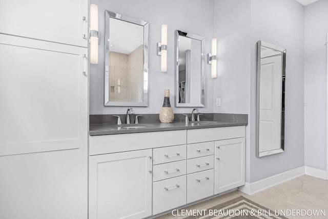 13944 Harrington Lndg, Holland, MI 49424 - full bath with double vanity and baseboards
