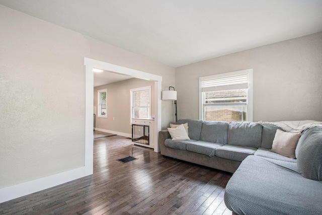 1538 Rossman Ave SE, Grand Rapids, MI 49507 - living area with plenty of natural light, hardwood / wood-style floors, and baseboards