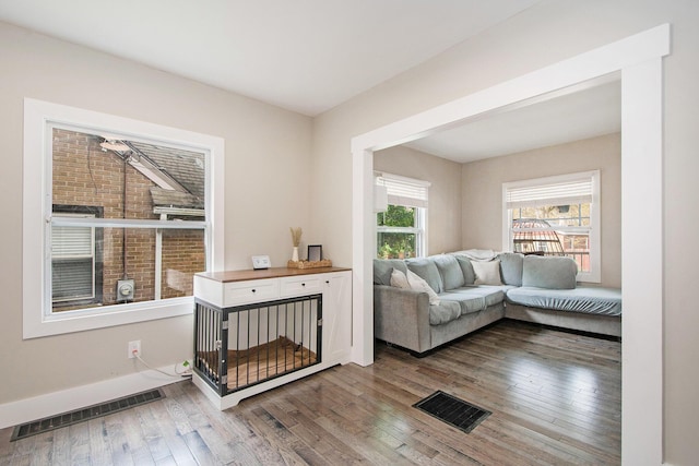 1538 Rossman Ave SE, Grand Rapids, MI 49507 - living room with hardwood / wood-style floors and baseboards