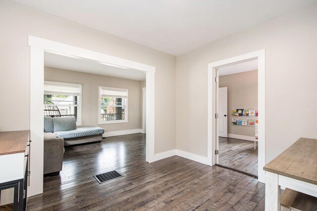 1538 Rossman Ave SE, Grand Rapids, MI 49507 - hall with dark wood finished floors and baseboards