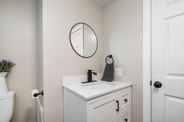 1538 Rossman Ave SE, Grand Rapids, MI 49507 - half bath with vanity and toilet