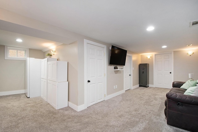 1538 Rossman Ave SE, Grand Rapids, MI 49507 - living room with light colored carpet, recessed lighting, and baseboards