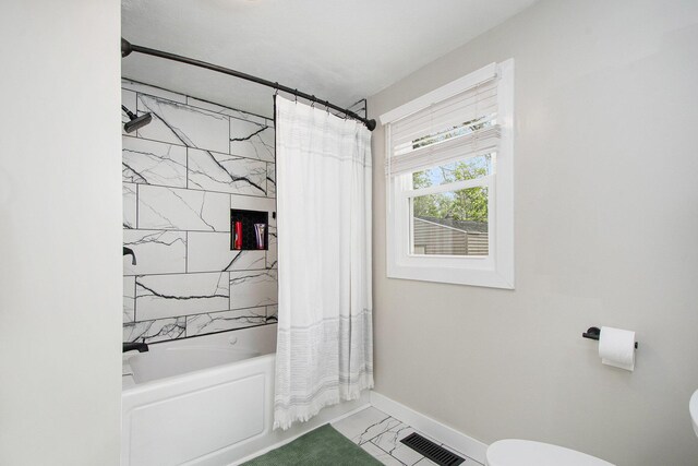 1538 Rossman Ave SE, Grand Rapids, MI 49507 - bathroom with toilet, marble look tiles, shower / bathtub combination with curtain, and baseboards