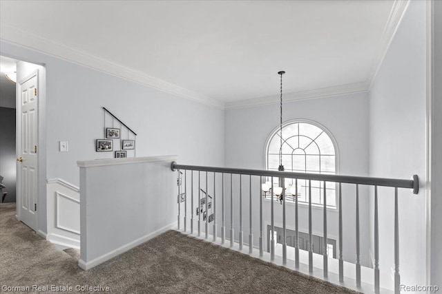 2941 Yosemite Dr, Orion, MI 48360 - corridor with carpet flooring, an upstairs landing, a chandelier, and crown molding