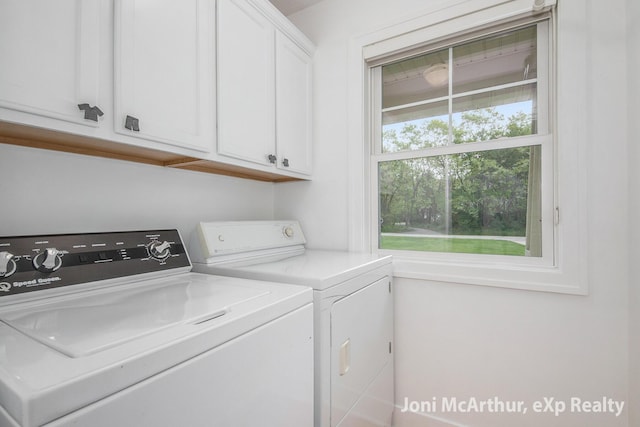 13 Foleys Grade, Lowell, MI 49331 - laundry room featuring cabinet space and washing machine and dryer