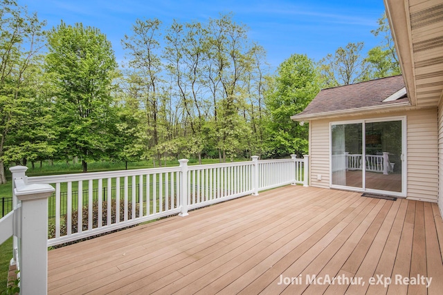 13 Foleys Grade, Lowell, MI 49331 - wooden deck featuring view of scattered trees