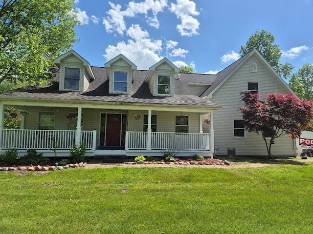 9428 Talladay Rd, Willis, MI 48191 - cape cod house with a porch and a front yard