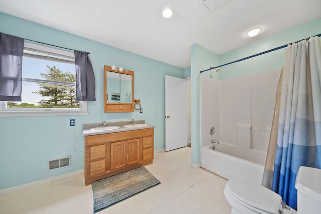 9428 Talladay Rd, Willis, MI 48191 - full bathroom with shower / bath combo with shower curtain, toilet, double vanity, and baseboards
