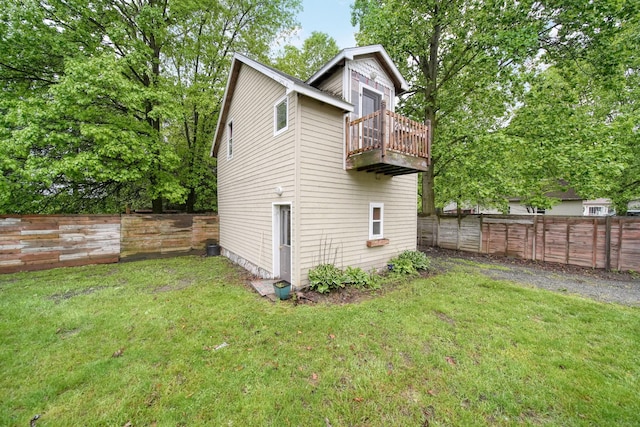 9428 Talladay Rd, Willis, MI 48191 - view of side of home featuring a balcony