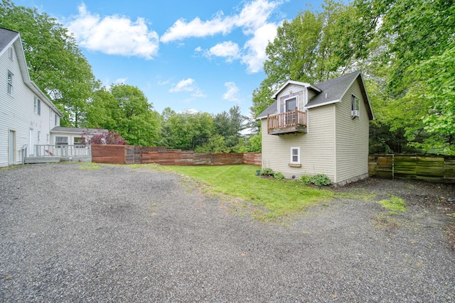 9428 Talladay Rd, Willis, MI 48191 - view of yard with a balcony and view of wooded area
