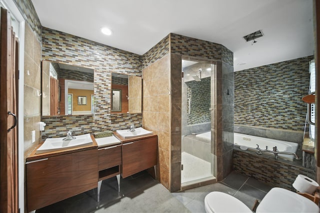 9428 Talladay Rd, Willis, MI 48191 - full bathroom with tile walls, tile patterned flooring, a shower stall, double vanity, and a garden tub