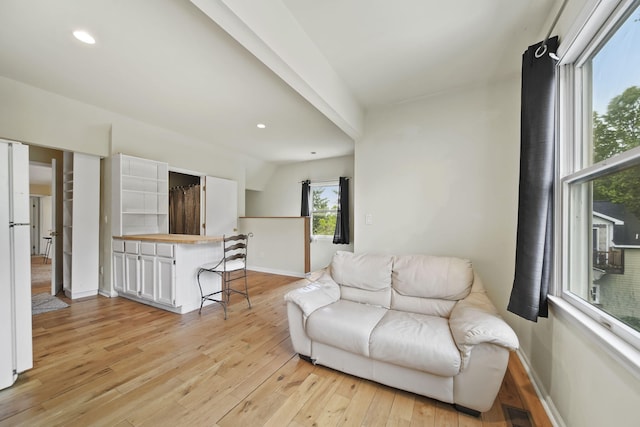 9428 Talladay Rd, Willis, MI 48191 - living area featuring light wood-style floors, baseboards, and recessed lighting