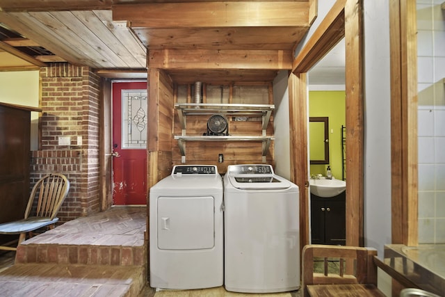 9428 Talladay Rd, Willis, MI 48191 - laundry room with washer and dryer and wooden ceiling