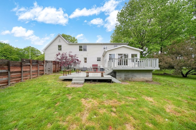 9428 Talladay Rd, Willis, MI 48191 - back of property featuring a wooden deck and a sunroom
