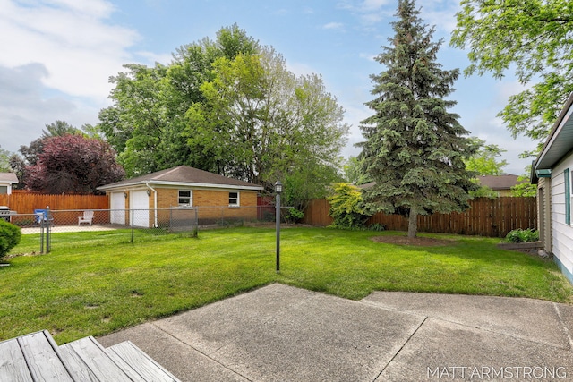 1272 Den Hertog St SW, Wyoming, MI 49509 - view of yard featuring a patio