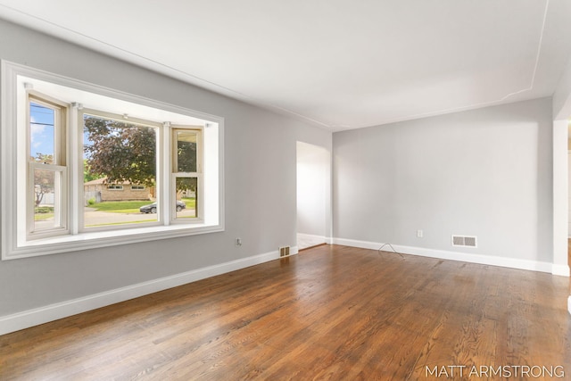 1272 Den Hertog St SW, Wyoming, MI 49509 - spare room with wood finished floors and baseboards