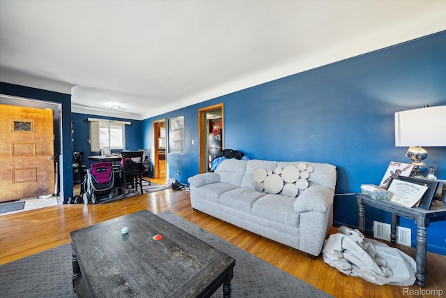 11359 Braile St, Detroit, MI 48228 - living room featuring wood finished floors and an office area