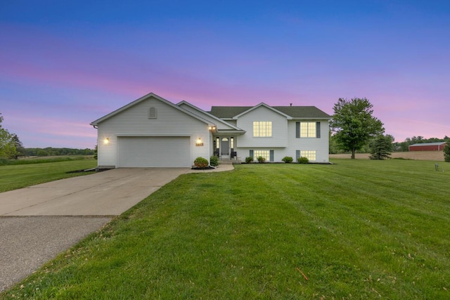 1443 140th Ave, Wayland, MI 49348 - split level home featuring a garage, driveway, and a yard