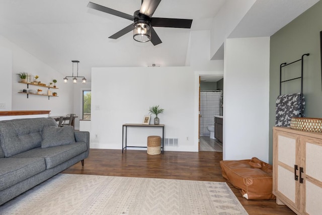 1443 140th Ave, Wayland, MI 49348 - living room with wood finished floors, vaulted ceiling, ceiling fan, and baseboards