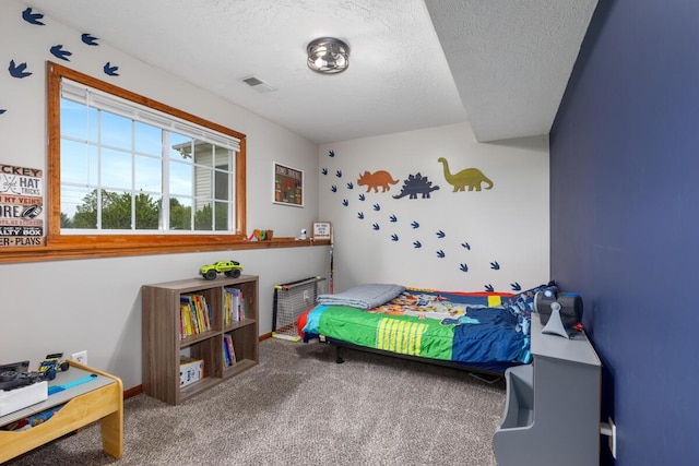 1443 140th Ave, Wayland, MI 49348 - carpeted bedroom with a textured ceiling and baseboards