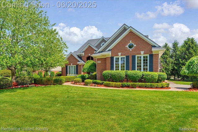 22858 Saint George Cir S, Lyon, MI 48178 - view of front of home featuring brick siding and a front yard