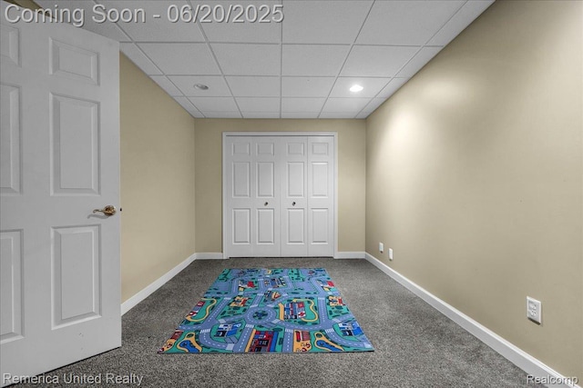 22858 Saint George Cir S, Lyon, MI 48178 - unfurnished bedroom featuring carpet floors, a drop ceiling, a closet, and recessed lighting