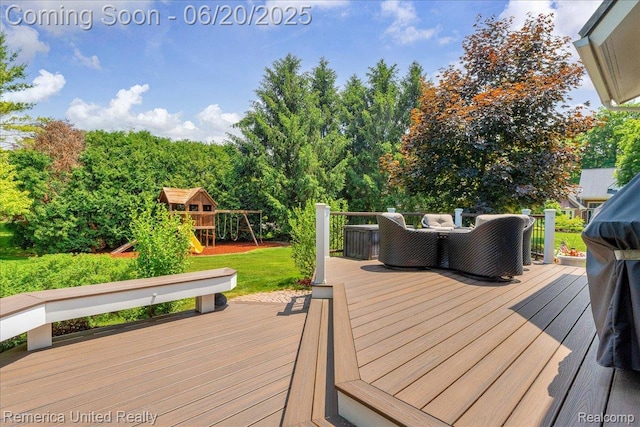22858 Saint George Cir S, Lyon, MI 48178 - wooden deck with a playground