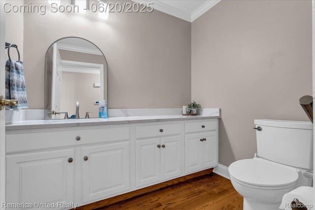 22858 Saint George Cir S, Lyon, MI 48178 - bathroom featuring crown molding, vanity, and wood finished floors