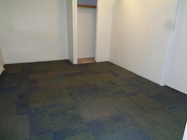 510 S Main, Mount Pleasant, MI 48858 - unfurnished bedroom featuring carpet flooring and a closet