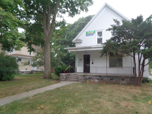510 S Main, Mount Pleasant, MI 48858 - view of front facade with covered porch and a front yard