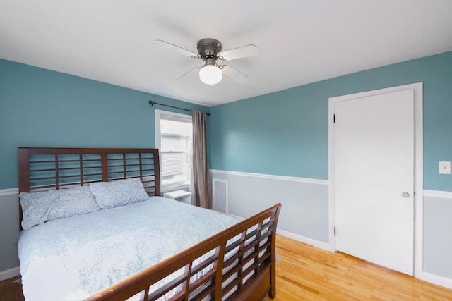 2720 Willa Dr, Saint Joseph, MI 49085 - bedroom with wood finished floors, baseboards, and ceiling fan
