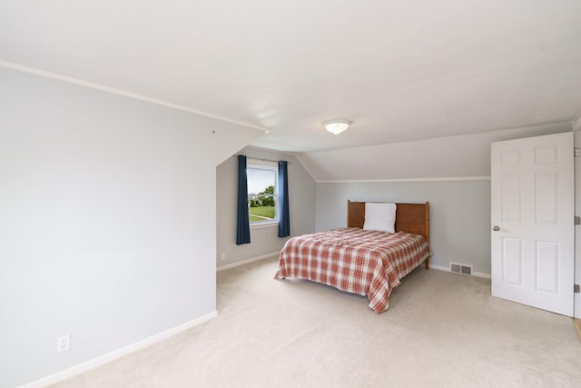 2720 Willa Dr, Saint Joseph, MI 49085 - bedroom with light colored carpet, baseboards, and vaulted ceiling
