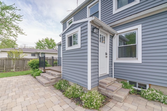 2720 Willa Dr, Saint Joseph, MI 49085 - doorway to property with a patio area and a deck