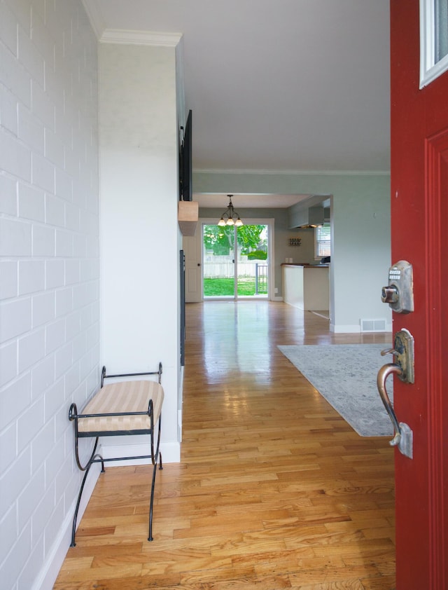 2720 Willa Dr, Saint Joseph, MI 49085 - corridor featuring crown molding and light wood-type flooring
