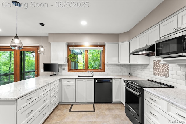 29915 Ardmore Dr, Farmington, MI 48334 - kitchen with dishwasher, range with electric stovetop, stainless steel microwave, under cabinet range hood, and a sink