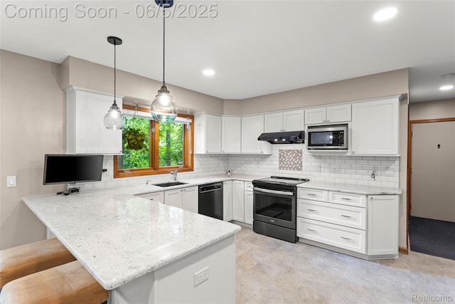 29915 Ardmore Dr, Farmington, MI 48334 - kitchen with appliances with stainless steel finishes, a peninsula, a sink, exhaust hood, and white cabinetry