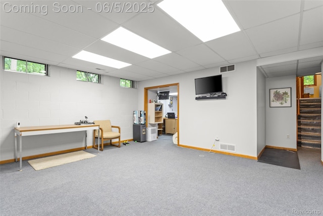 29915 Ardmore Dr, Farmington, MI 48334 - below grade area featuring healthy amount of natural light, stairway, carpet floors, concrete block wall, and a paneled ceiling