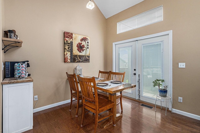 764 Allen Rd, Milan, MI 48160 - dining space featuring wood finished floors, baseboards, and vaulted ceiling