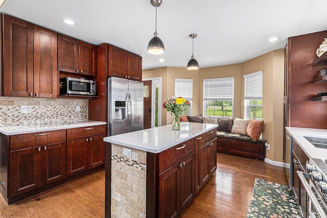 764 Allen Rd, Milan, MI 48160 - kitchen with stainless steel appliances, wood finished floors, light countertops, and recessed lighting
