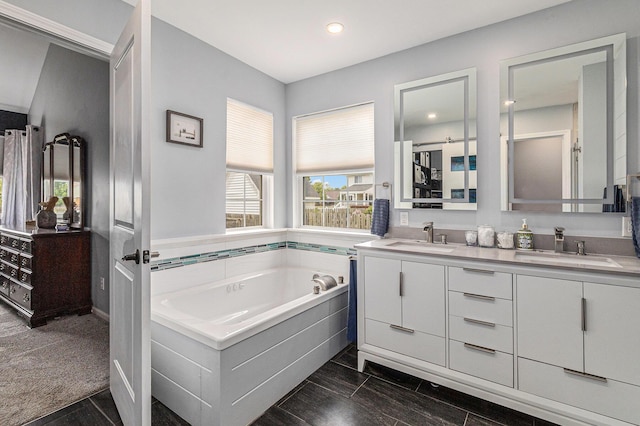 764 Allen Rd, Milan, MI 48160 - bathroom featuring double vanity, a garden tub, and recessed lighting