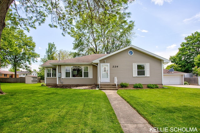 226 Palms St SW, Grand Rapids, MI 49548 - ranch-style home with an outbuilding, a detached garage, and a shingled roof