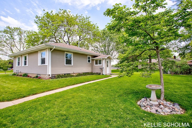 226 Palms St SW, Grand Rapids, MI 49548 - view of front of house featuring a front yard