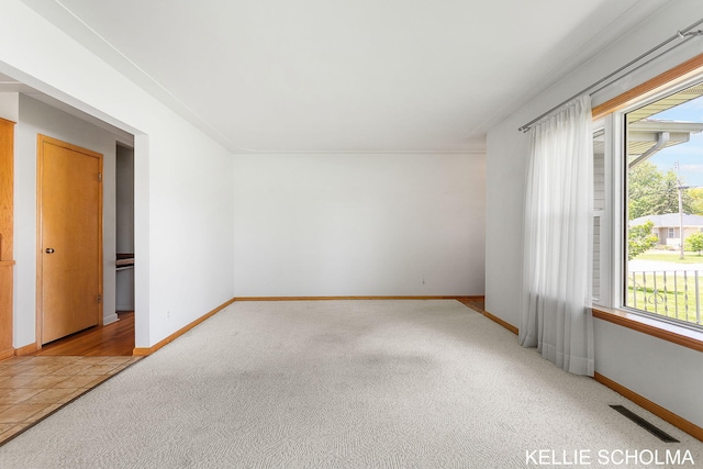 226 Palms St SW, Grand Rapids, MI 49548 - carpeted spare room with baseboards