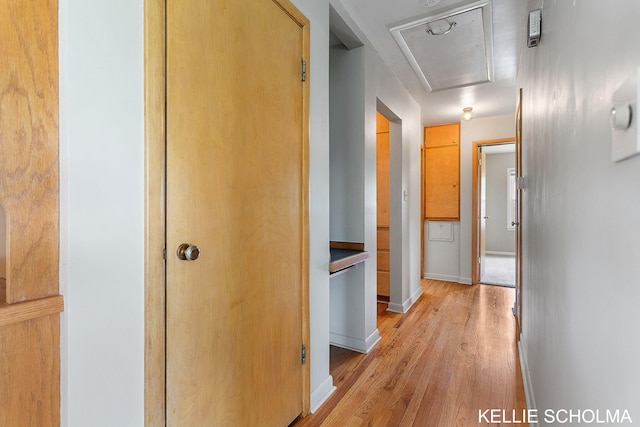 226 Palms St SW, Grand Rapids, MI 49548 - corridor featuring light wood-style floors, baseboards, and attic access