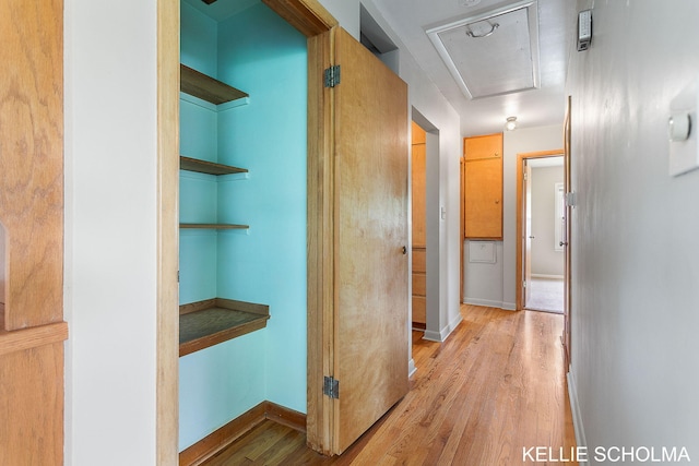 226 Palms St SW, Grand Rapids, MI 49548 - corridor featuring light wood-style flooring, attic access, and baseboards