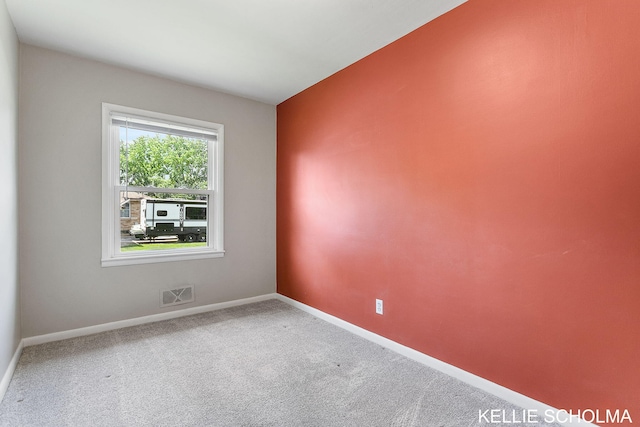 226 Palms St SW, Grand Rapids, MI 49548 - carpeted spare room featuring baseboards