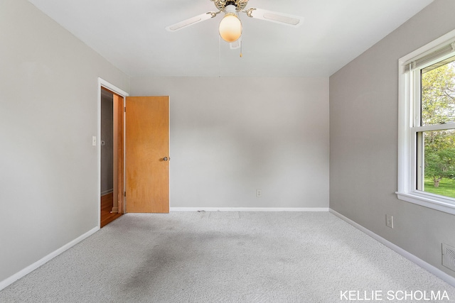 226 Palms St SW, Grand Rapids, MI 49548 - carpeted spare room featuring ceiling fan and baseboards